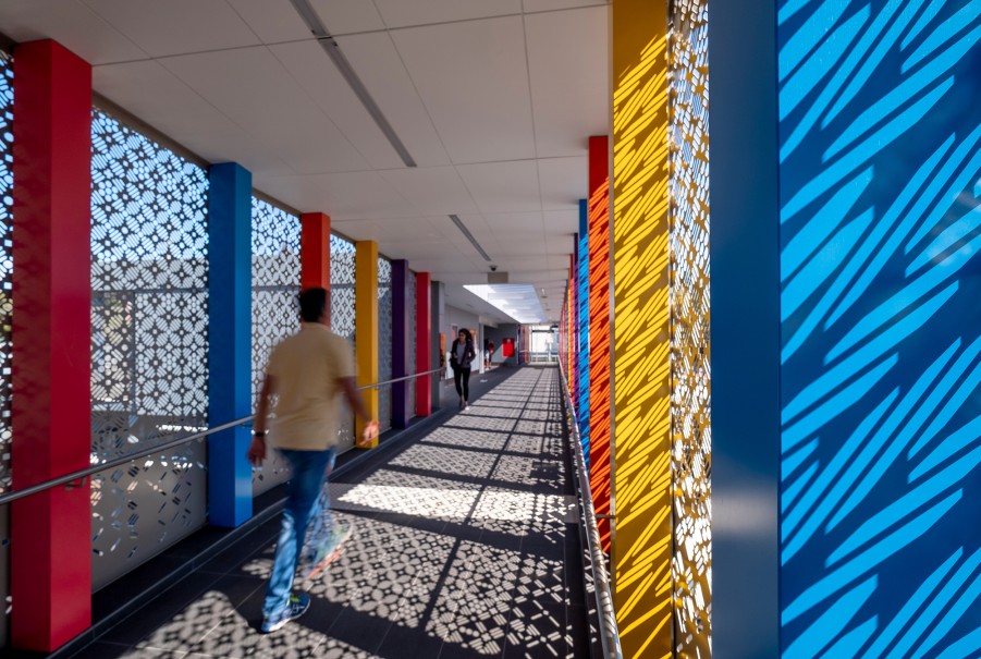 DesignInc Sydney - Harris Park Station pedestrian bridge with perforated screen