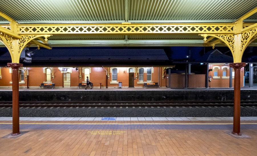 The view across tracks from under the awning to the heritage building on opposite platform