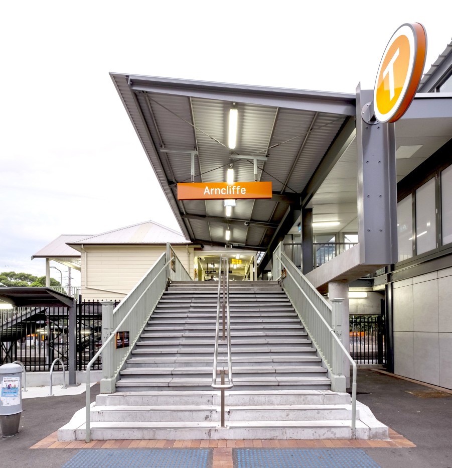 Looking up at the entry stairs from street level at Arncliffe Station