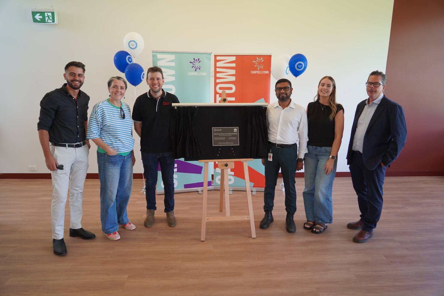 DesignInc Sydney's Megan Walker with council members and construction partners at the official opening of Bob Prenter Reserve Amenities Building